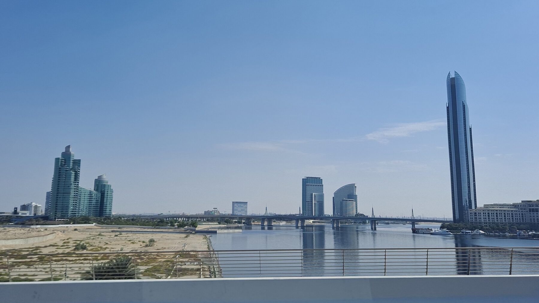 New residential towers rising on a Dubai waterfront