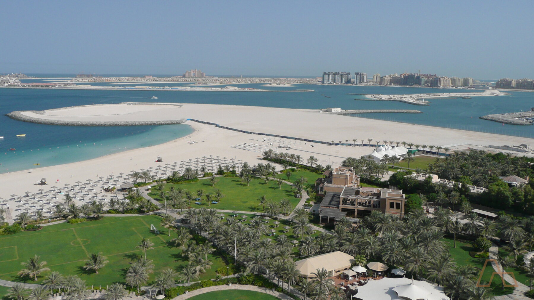 Beachfront gardens and the Palm beyond