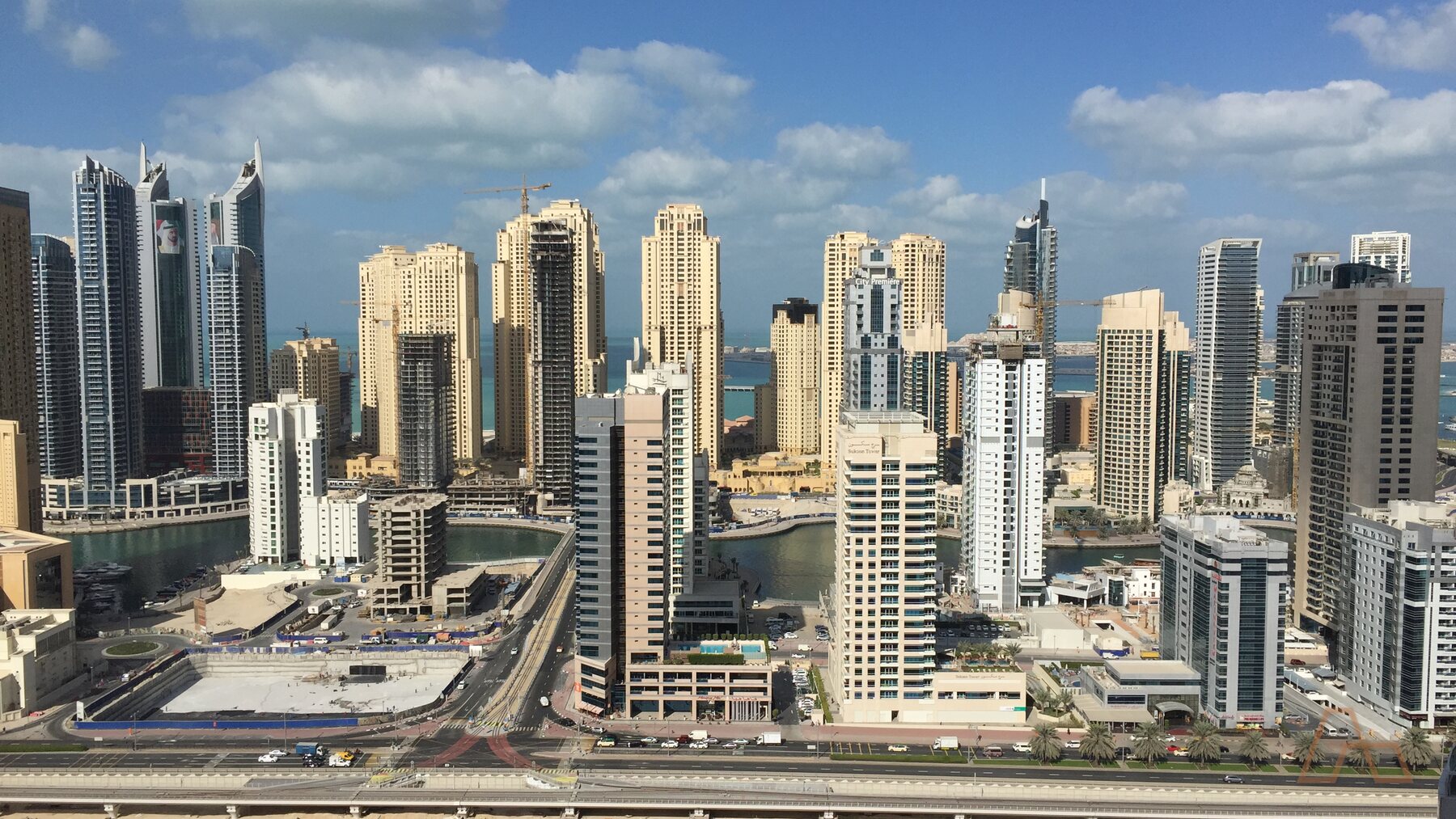 Dense residential towers in a Dubai district