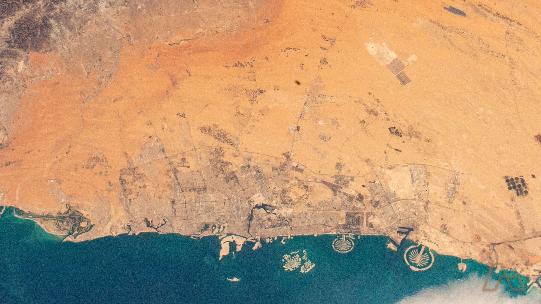 Dubai's coast and the desert edge from orbit