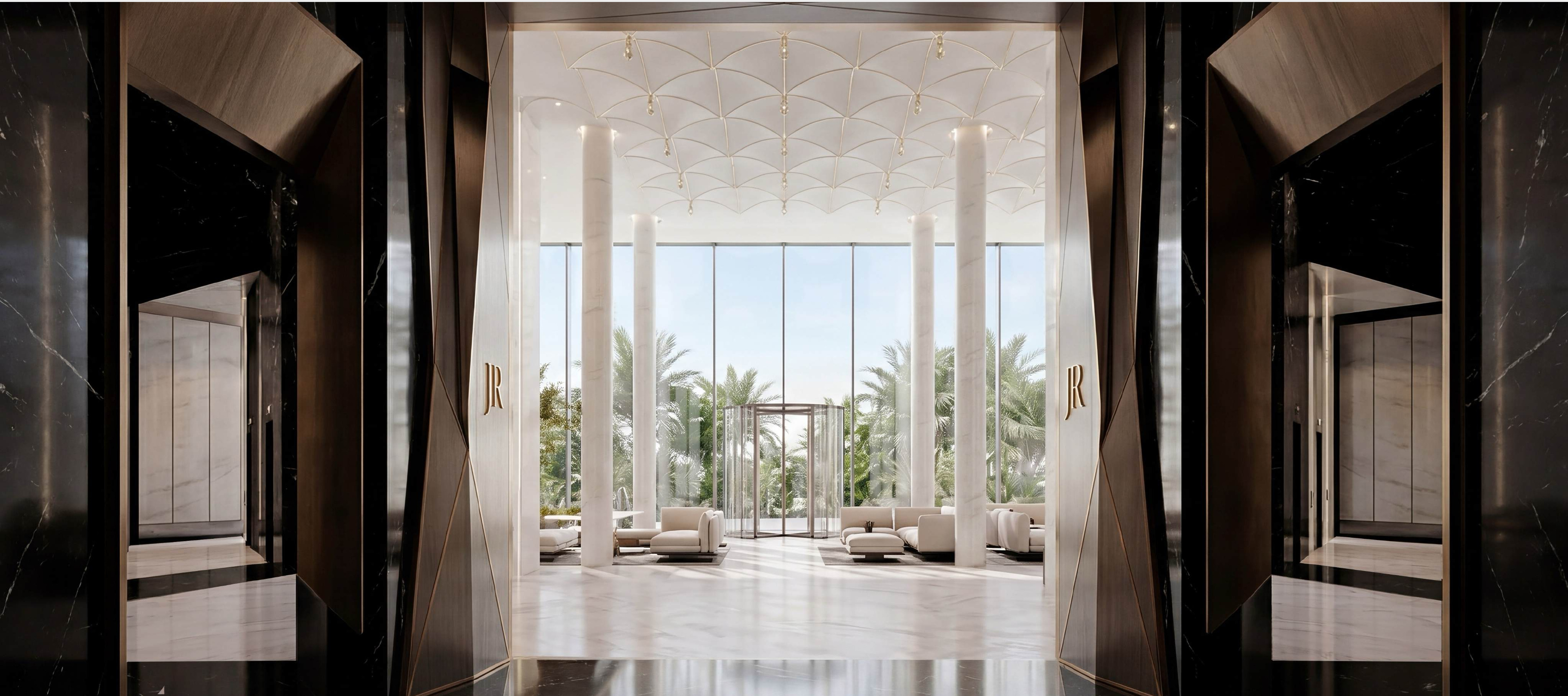 Double-height branded lobby entrance at Richmond Residences