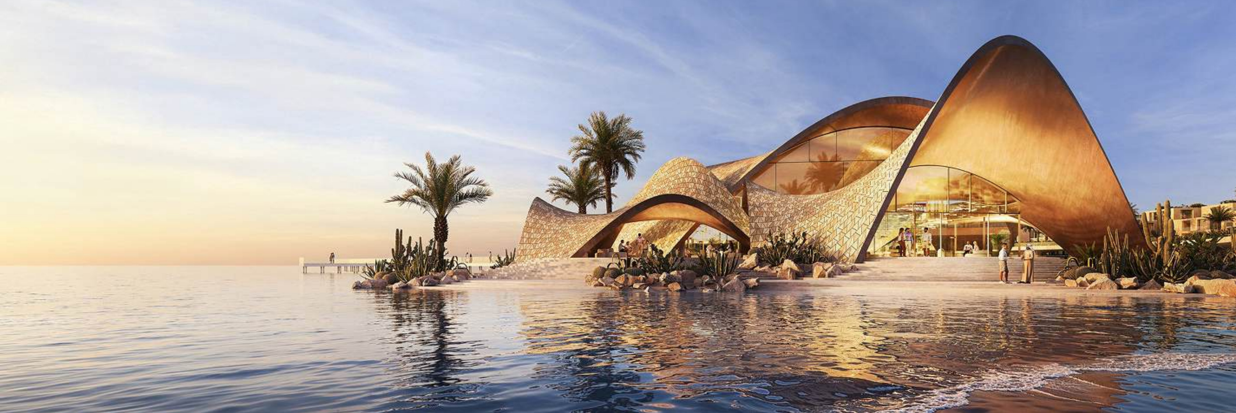 Sculptural beach pavilion at Mira Coral Bay at sunset